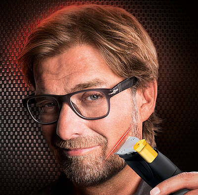 Der Philips Beard Trimmer 9000 mit Laser Guide projiziert als Orientierungshilfe für ein perfektes  Bartstyling eine scharfe rote Linie auf Wange, Kinn oder Hals und zeigt damit eine exakte Schneidllinie des Trimmers an