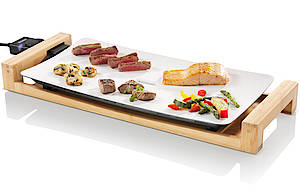 Der Tischgrill Pure mit einer Grillplatte aus Keramik, die extrem strapazierfähig, kratzfest und spülmaschinen geeignet ist