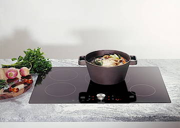 Bedingungslos funktional: der Twist-Pad-Magnetknebel der großen Induktionsfelder<br>(Fotos: Gaggenau)