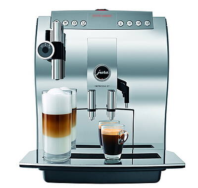 Optisch Akzente setzen der neue höhenverstellbare Cappuccino-Auslauf und der höhen- und breitenverstellbare Kaffeeauslauf aus massivem Aluminium und Edelstahl