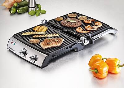 Um die Grillfläche zu vergrößern, kann der Kontaktgrill auch aufgeklappt werden