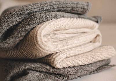 Miele WoolCare mit pflegenden Weizenproteinen reinigt sanft und erhält die Struktur