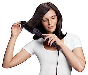 Die Philips ProCare Stylingbürste HP8634 erleichtert mit einziehbaren Borsten das Lösen der Haare und emöglicht mit zwei Temperaturen schonend  Lieblingsfrisuren