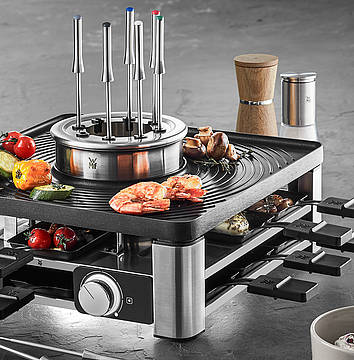 Social Dining vom Feinsten - denn mit der WMF Gourmet Station 3in1 werden Raclette, Fondue & Tischgrillen für acht Personen in einem Gerät kombiniert, da kommt jeder auf seinen Geschmack